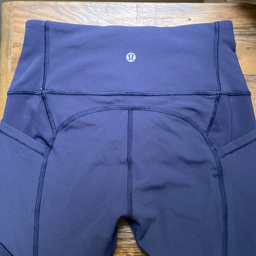 Blue Lululemon leggings with side pockets